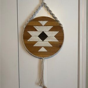 Handcrafted Round Wooden Wall Art with White and Black Geometric Motif